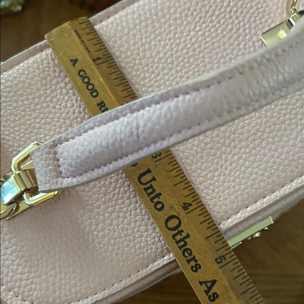 Tommy Bahama Wicker & Pink
Faux Leather Crossbody - Picture 9 of 15